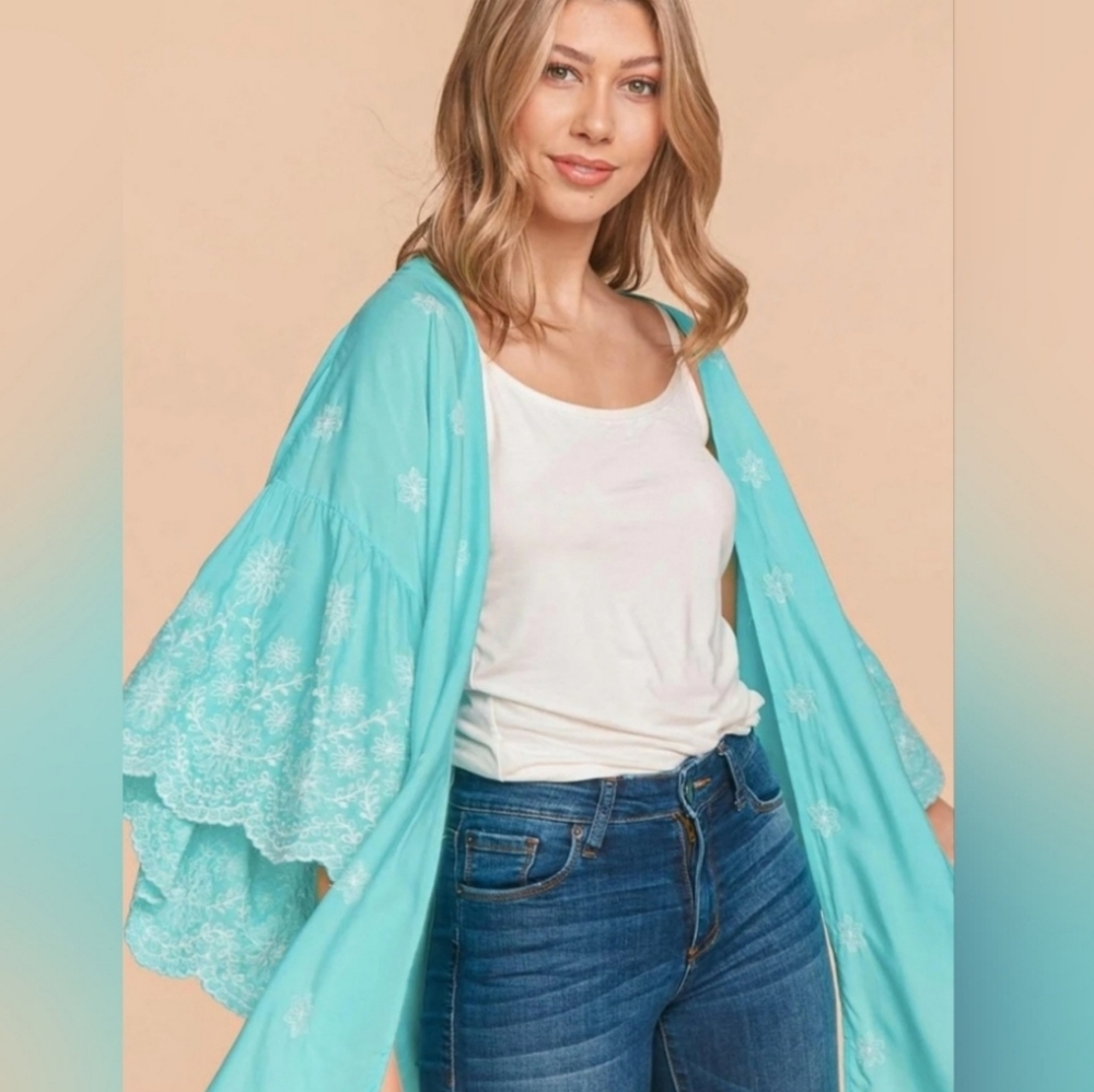 Turquoise Kimono with White Floral Patterns
